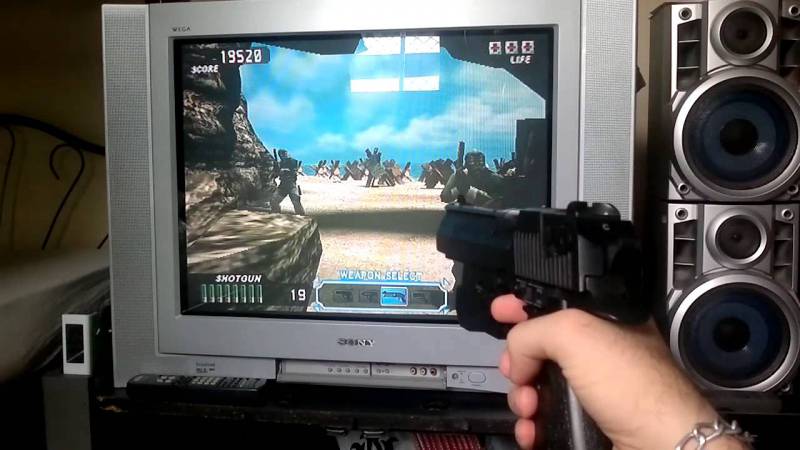 Napad z pistoletem do PlayStation w ręku
